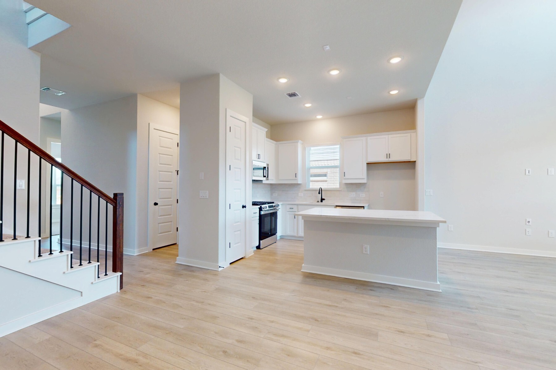 20117 Aqua Reef Drive Austin, TX 78747 - Photo 7 of 40 a view of kitchen and kitchen with stainless steel appliances