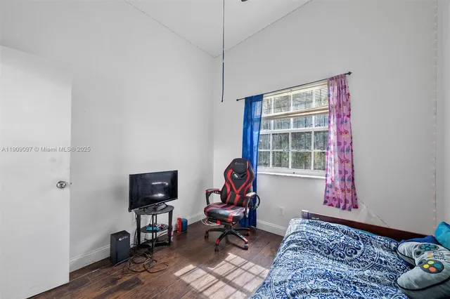 a living room with furniture and rug