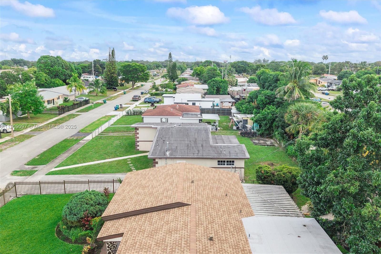 1960 Northwest 187th Street Miami Gardens, FL 33056 - Photo 19 of 23 an aerial view of a house