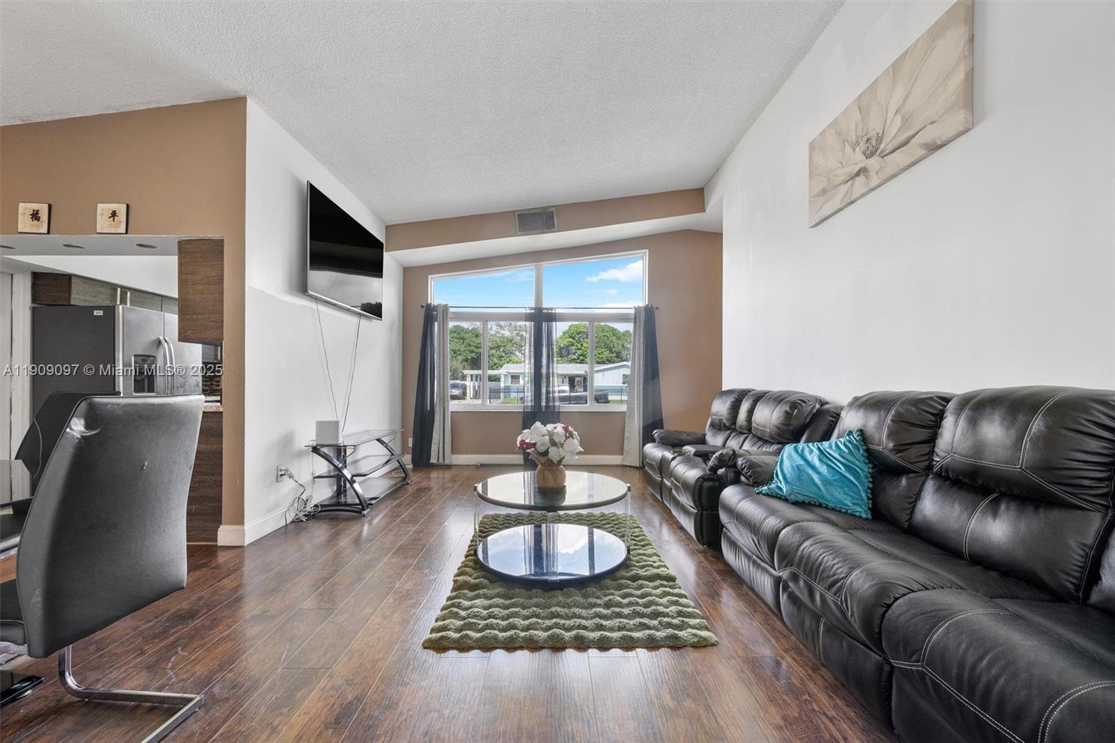 1960 Northwest 187th Street Miami Gardens, FL 33056 - Photo 4 of 23 a living room with furniture rug and window