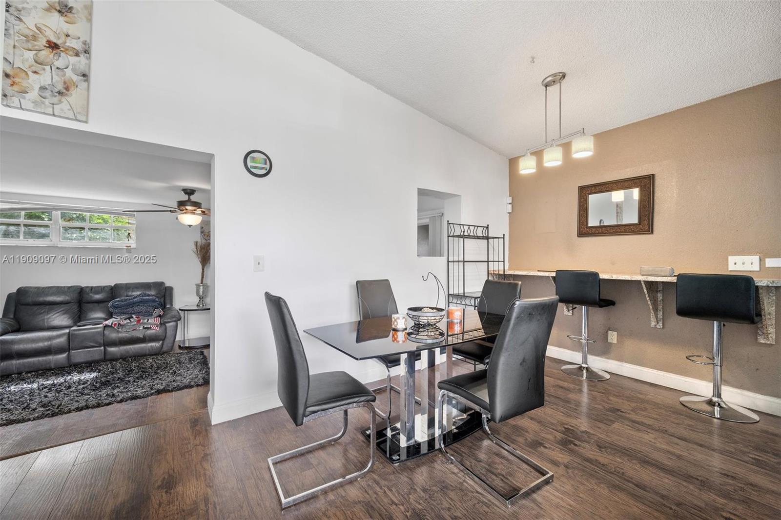 1960 Northwest 187th Street Miami Gardens, FL 33056 - Photo 6 of 23 a view of a livingroom with furniture and a window