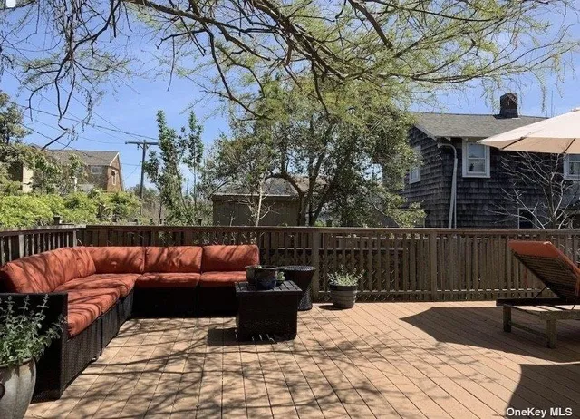 a outdoor space with patio the couches and a fire pit