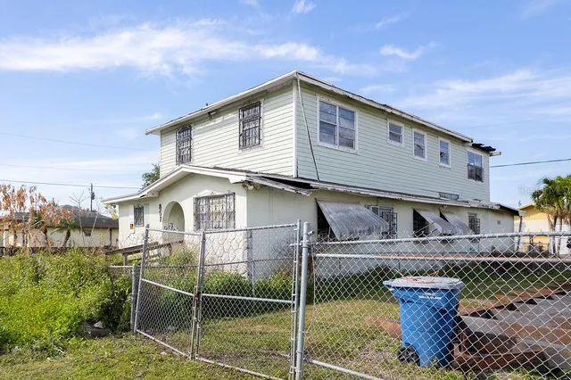 a house view with a garden space