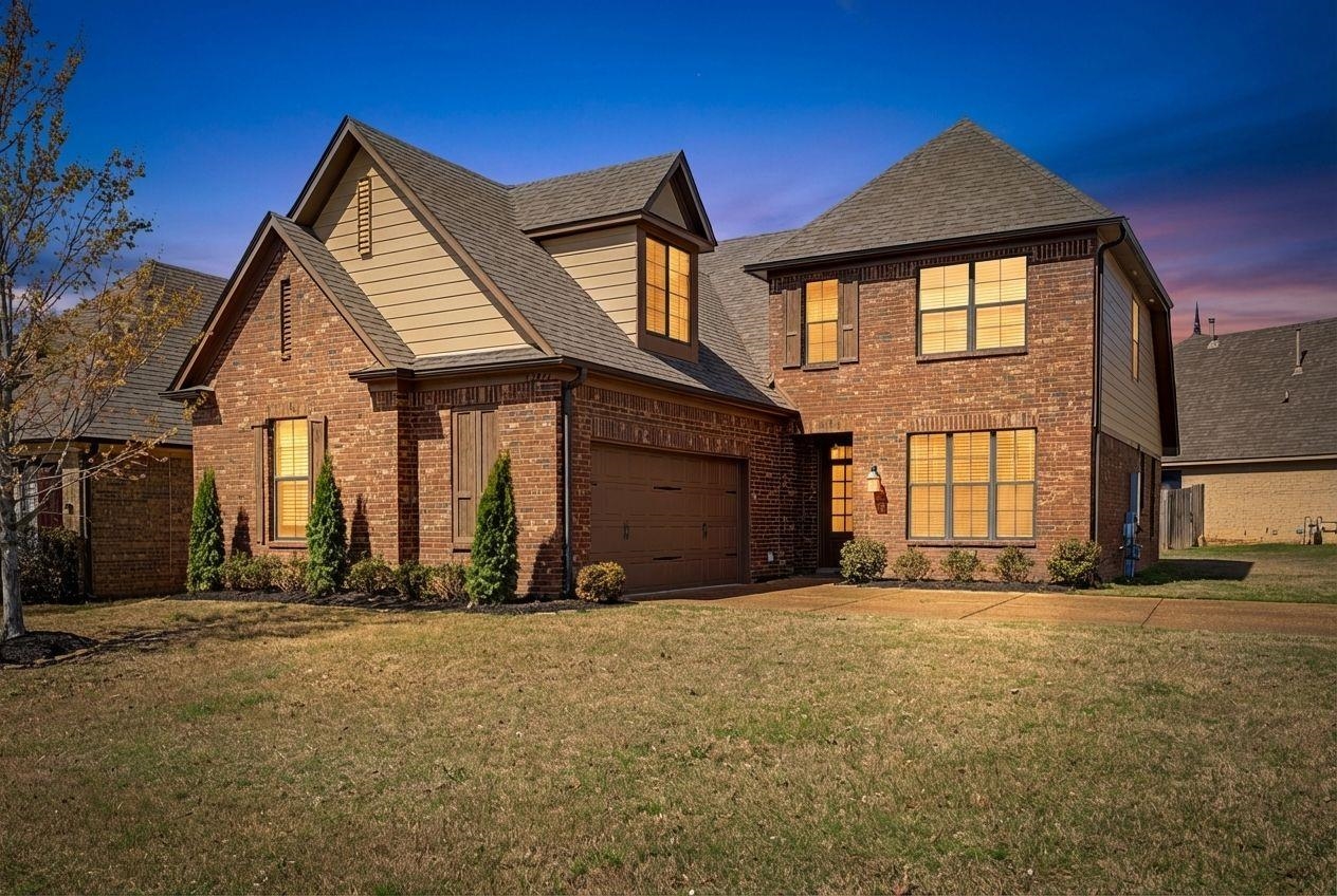 12436 Dusty Field Road Arlington, TN 38002 - Photo 1 of 40 View of front of property with roof with shingles, a front yard, brick siding, and driveway