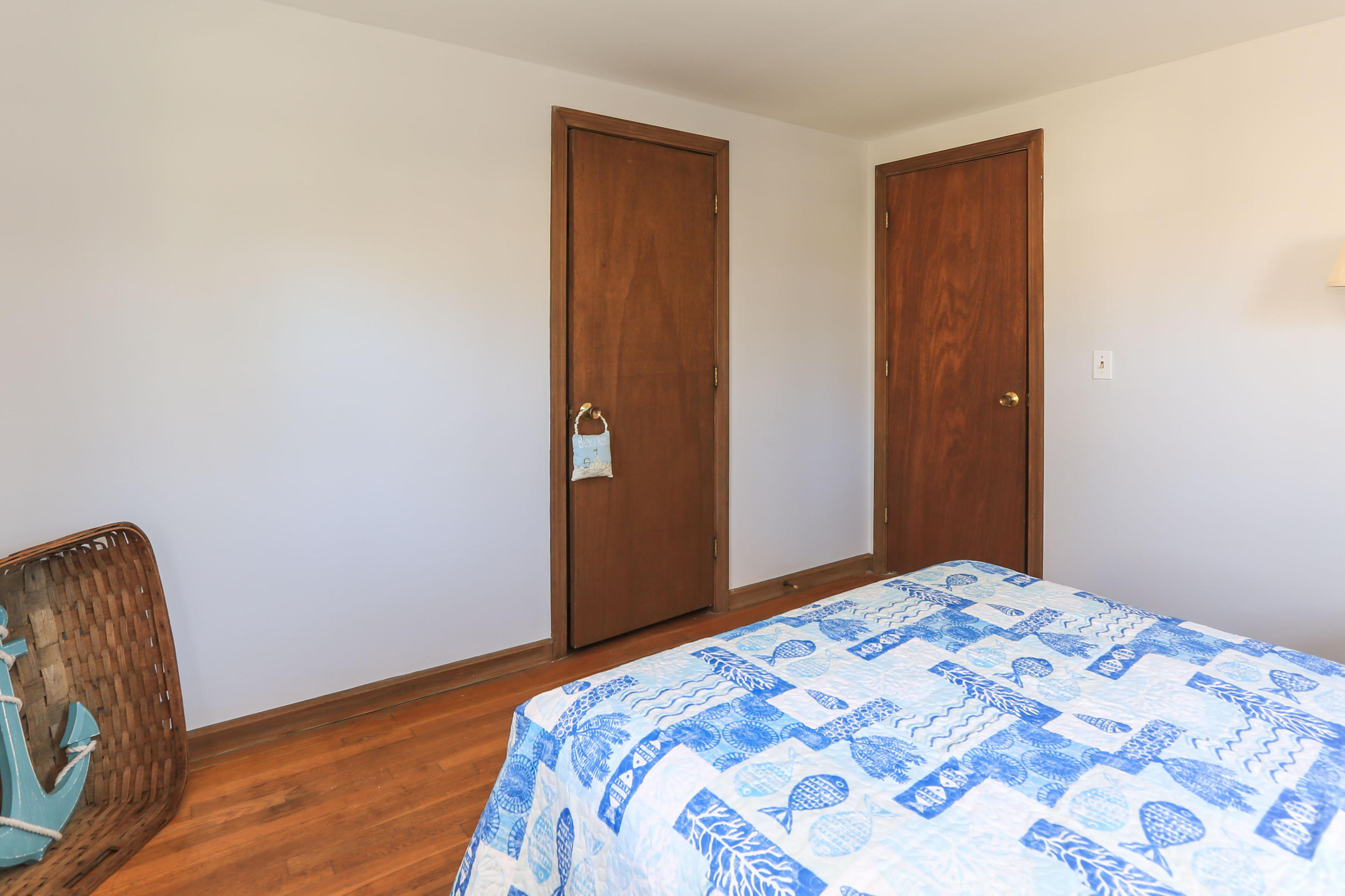35 Gunwale Road West Hyannis Port, MA 02601 - Photo 13 of 21 a bedroom with a bed and wooden floor