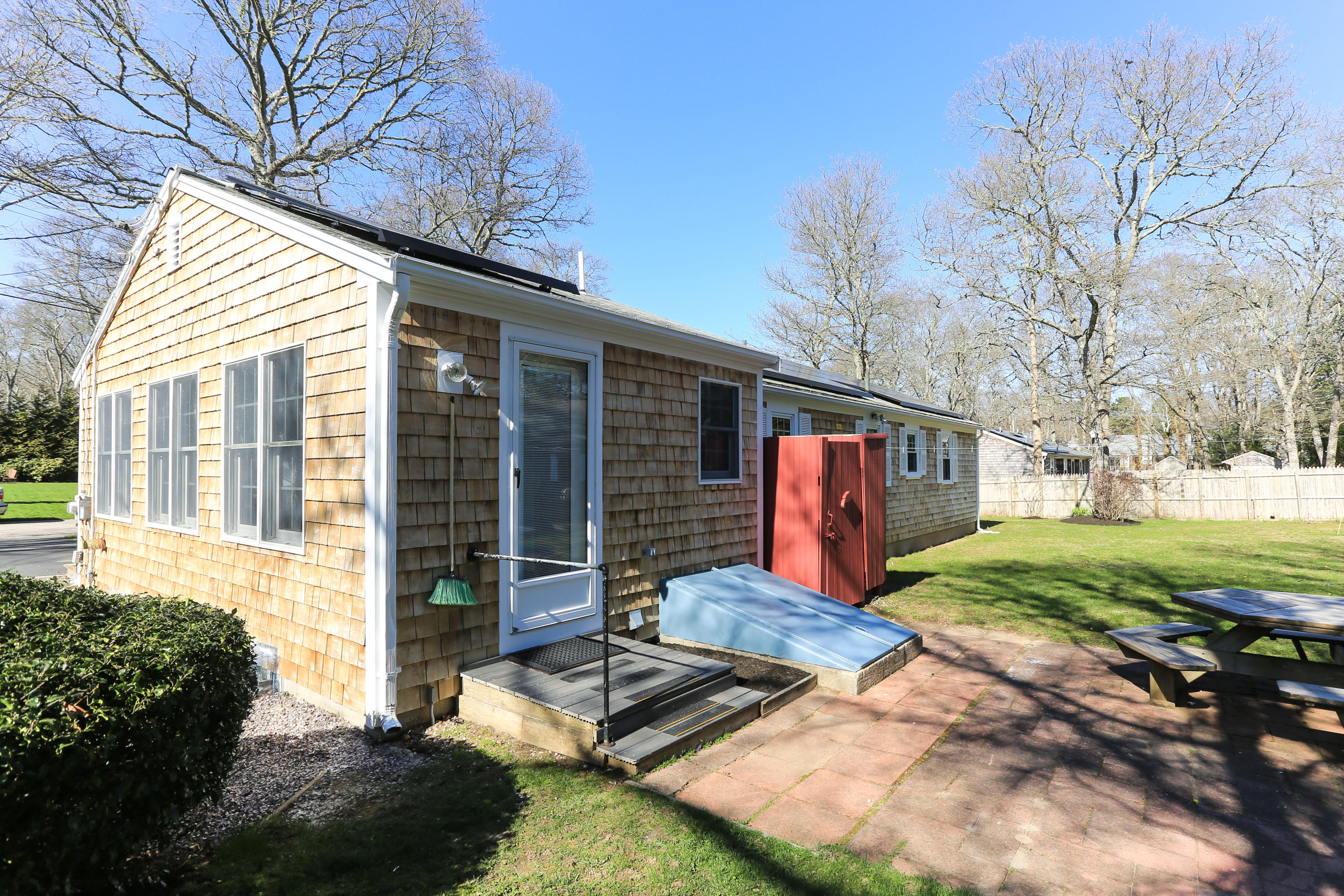 35 Gunwale Road West Hyannis Port, MA 02601 - Photo 17 of 21 a view of a backyard with large trees