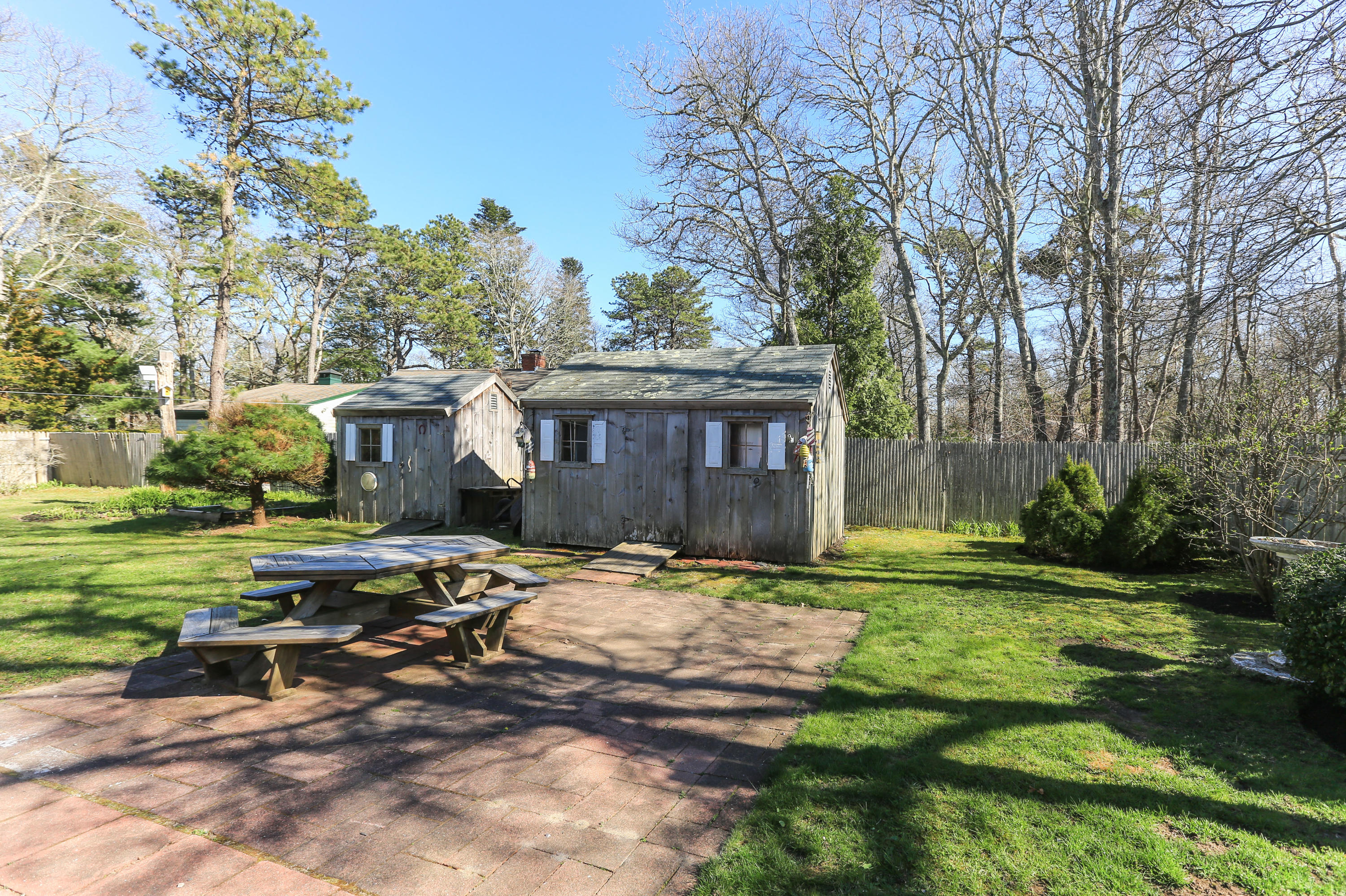 35 Gunwale Road West Hyannis Port, MA 02601 - Photo 18 of 21 a view of a house with backyard and sitting area