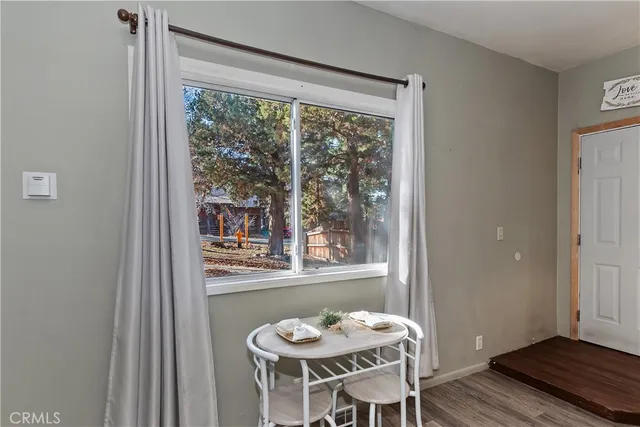 a kitchen with a sink and refrigerator