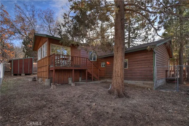 a view of a house with a yard and garage