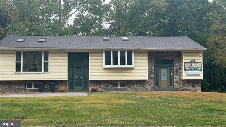 714-720 Harding Highway Carneys Point, NJ 08069 - Photo 14 of 42 a front view of a house with a yard