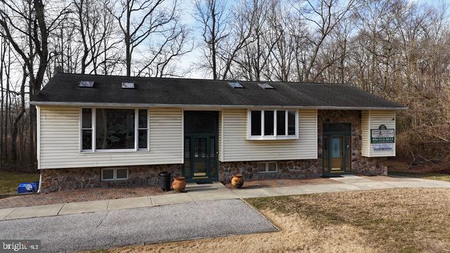 714-720 Harding Highway Carneys Point, NJ 08069 - Photo 2 of 42 a front view of a house with a yard