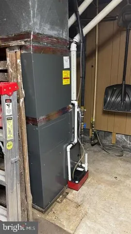 a view of storage and utility room with a sink