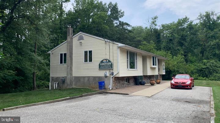 714-720 Harding Highway Carneys Point, NJ 08069 - Photo 7 of 40 a car parked in front of a house