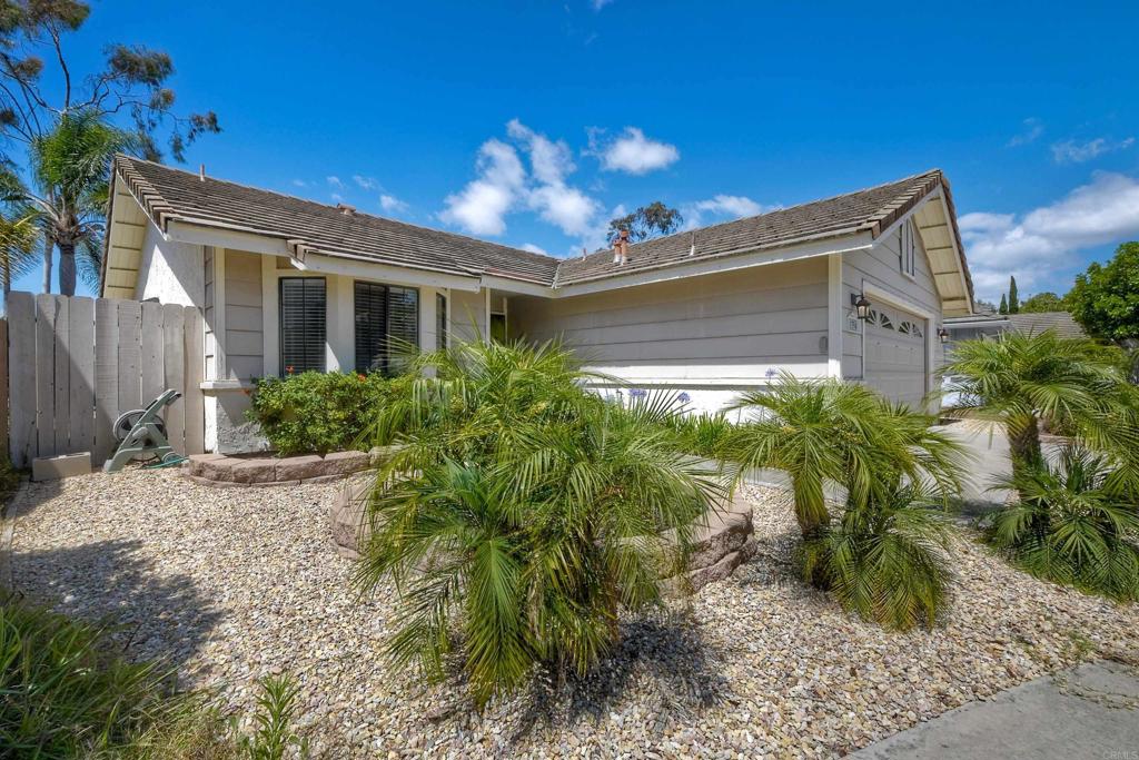 1394 Longfellow Road Vista, CA 92081 - Photo 4 of 50 a front view of house with yard