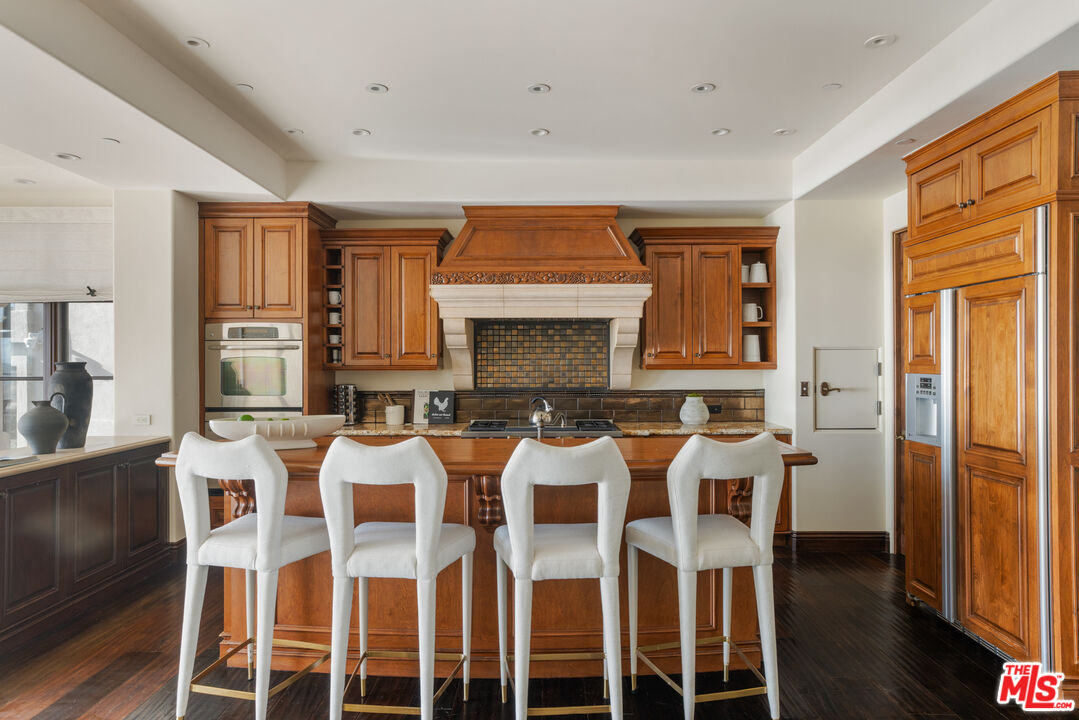 6209 Ocean Front Walk Playa del Rey, CA 90293 - Photo 12 of 57 a view of a dining room with furniture and wooden floor