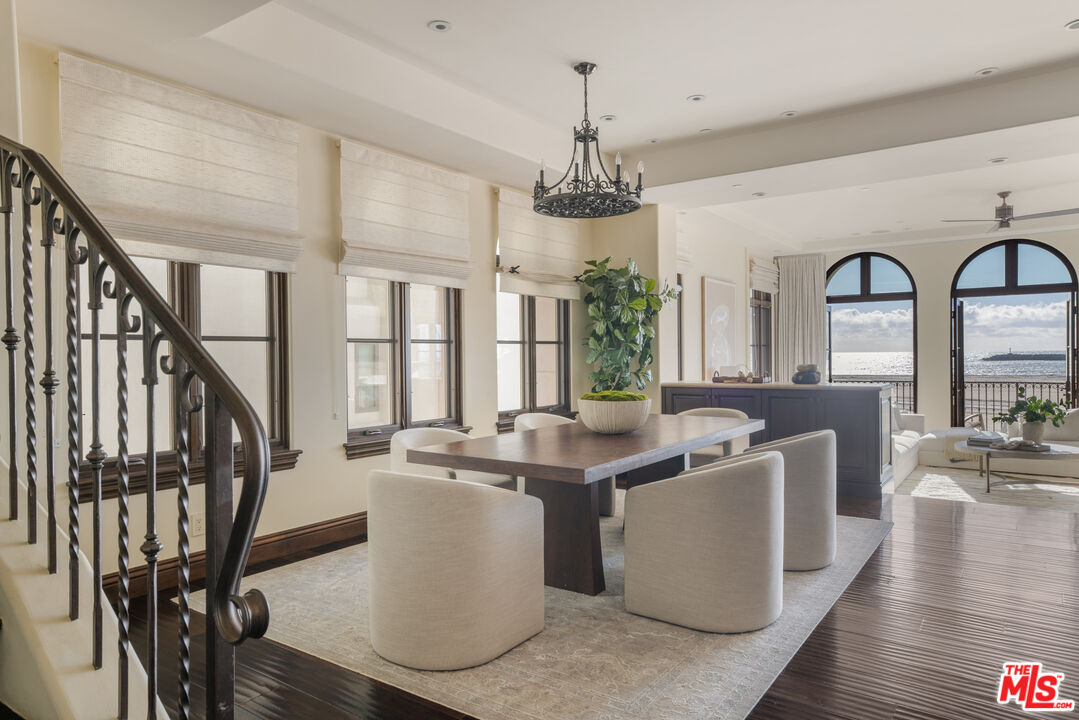 6209 Ocean Front Walk Playa del Rey, CA 90293 - Photo 16 of 57 a view of a dining room with furniture window and wooden floor