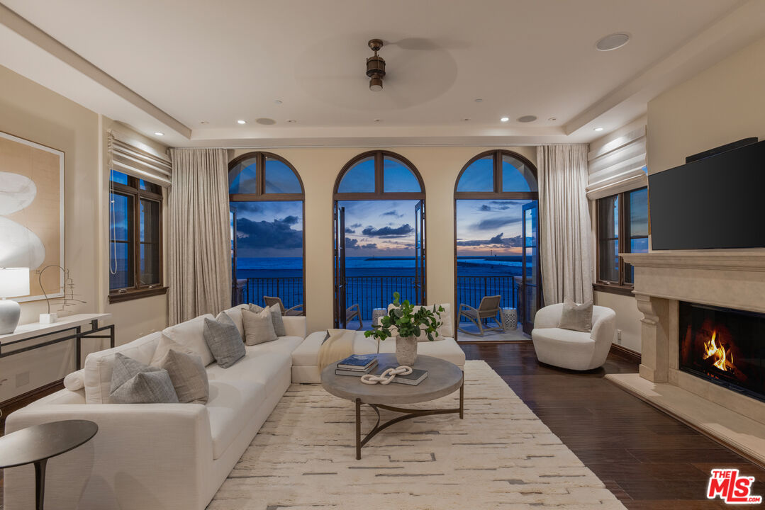 6209 Ocean Front Walk Playa del Rey, CA 90293 - Photo 17 of 57 a living room with furniture fireplace and flat screen tv
