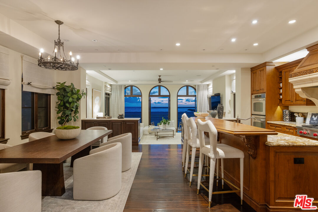 6209 Ocean Front Walk Playa del Rey, CA 90293 - Photo 18 of 57 a view of a dining room with furniture window and wooden floor