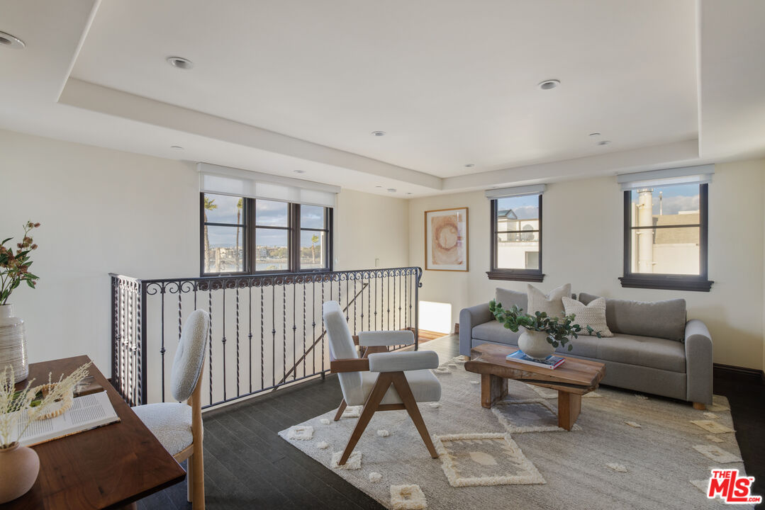 6209 Ocean Front Walk Playa del Rey, CA 90293 - Photo 27 of 57 a living room with furniture and windows