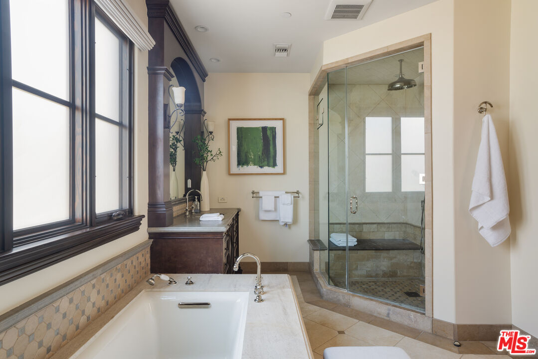 6209 Ocean Front Walk Playa del Rey, CA 90293 - Photo 33 of 57 a bathroom with a tub shower and sink