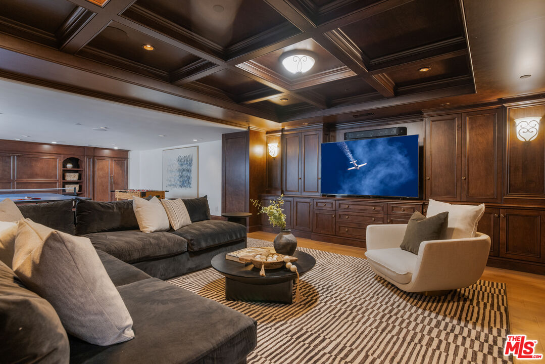 6209 Ocean Front Walk Playa del Rey, CA 90293 - Photo 46 of 57 a living room with furniture and a chandelier