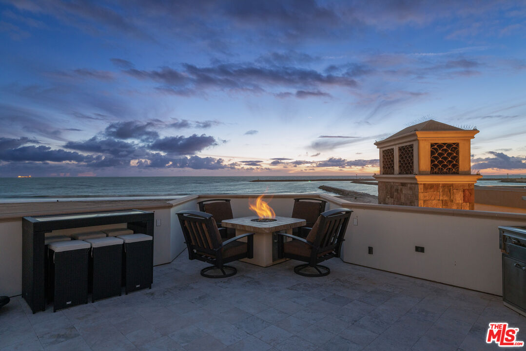 6209 Ocean Front Walk Playa del Rey, CA 90293 - Photo 51 of 57 a room with furniture and a fireplace