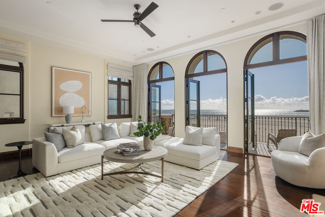 6209 Ocean Front Walk Playa del Rey, CA 90293 - Photo 9 of 57 a living room with furniture and a large window