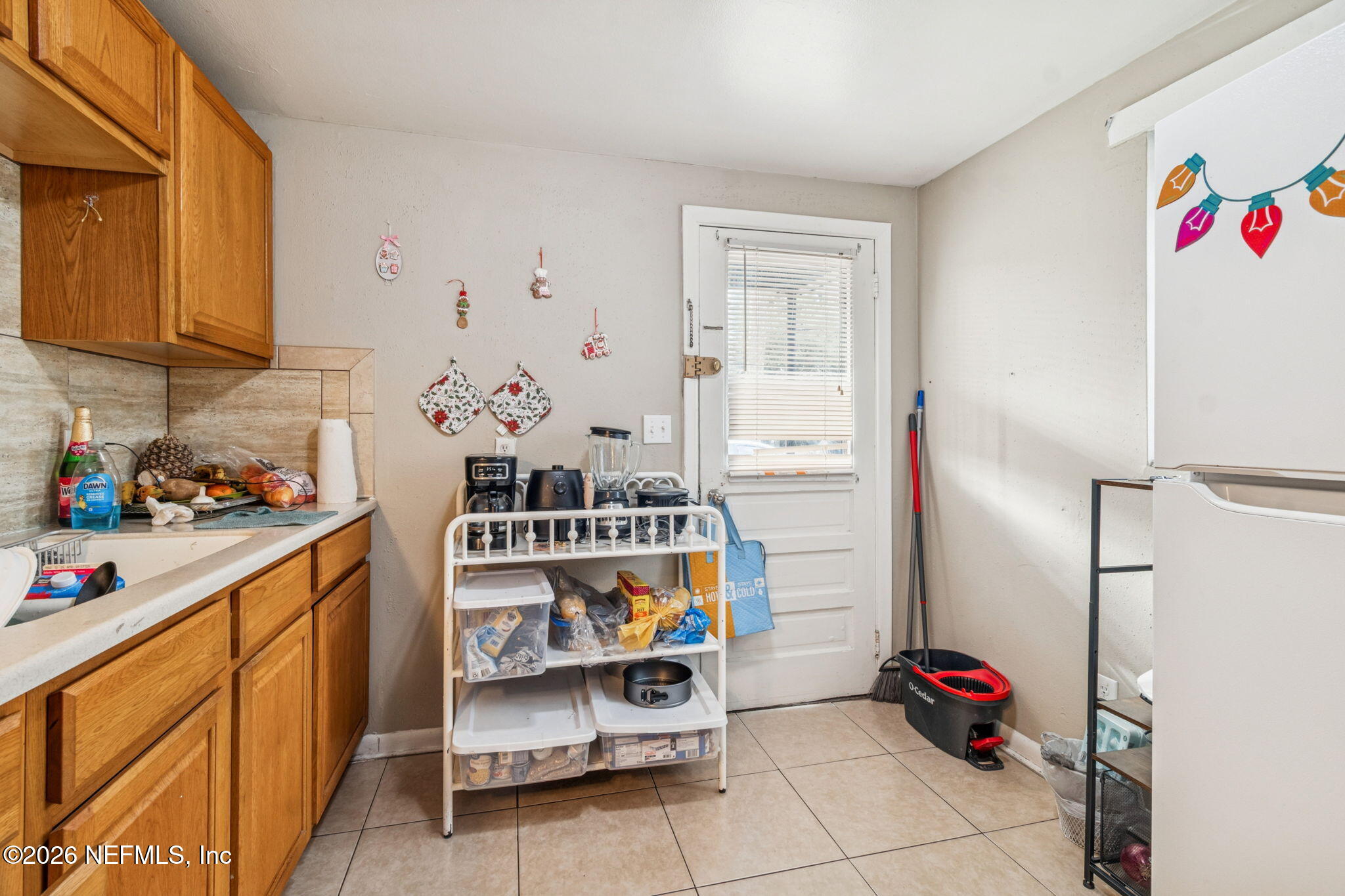 563 Eastport Road Jacksonville, FL 32218 - Photo 16 of 41 a room with storage and utility