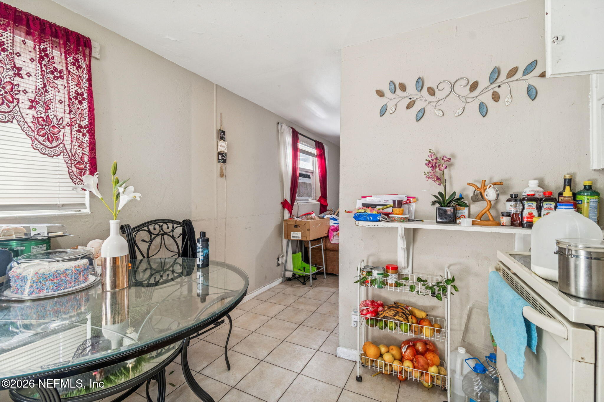 563 Eastport Road Jacksonville, FL 32218 - Photo 20 of 41 a living room with furniture and a table