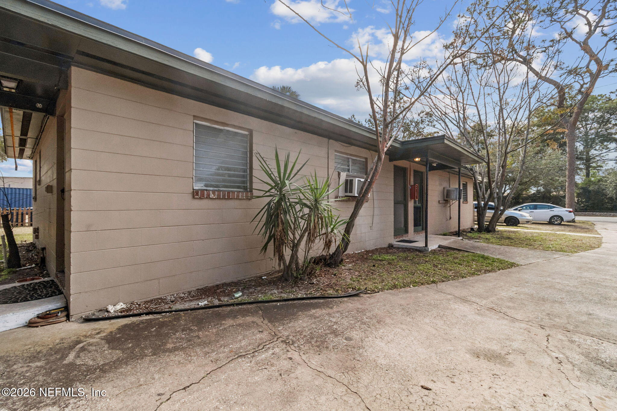 563 Eastport Road Jacksonville, FL 32218 - Photo 36 of 41 a view of garage and car parked