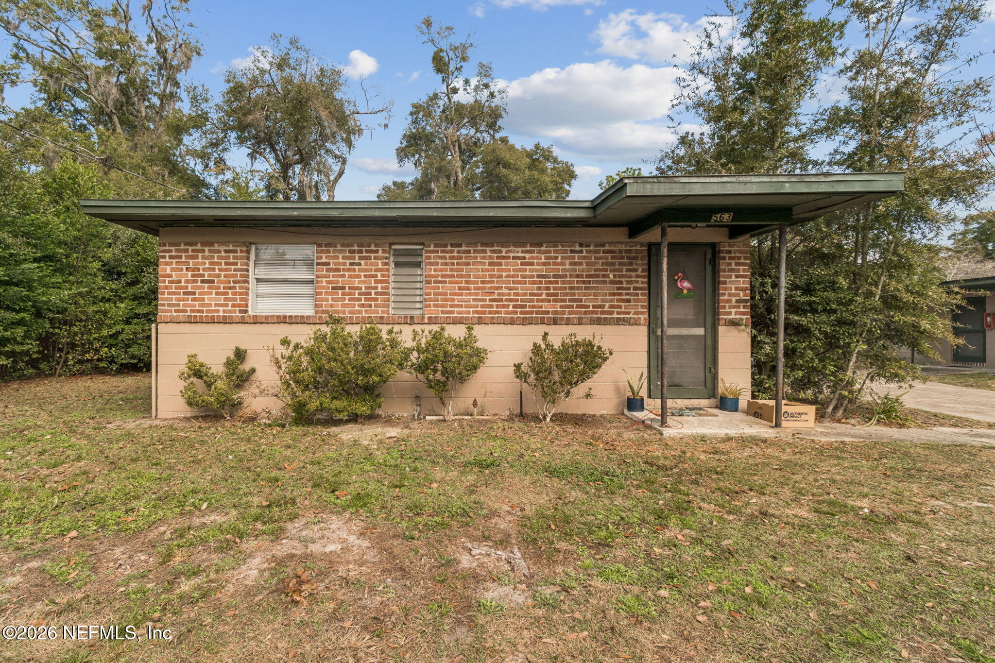 563 Eastport Road Jacksonville, FL 32218 - Photo 38 of 41 a front view of a house with a yard