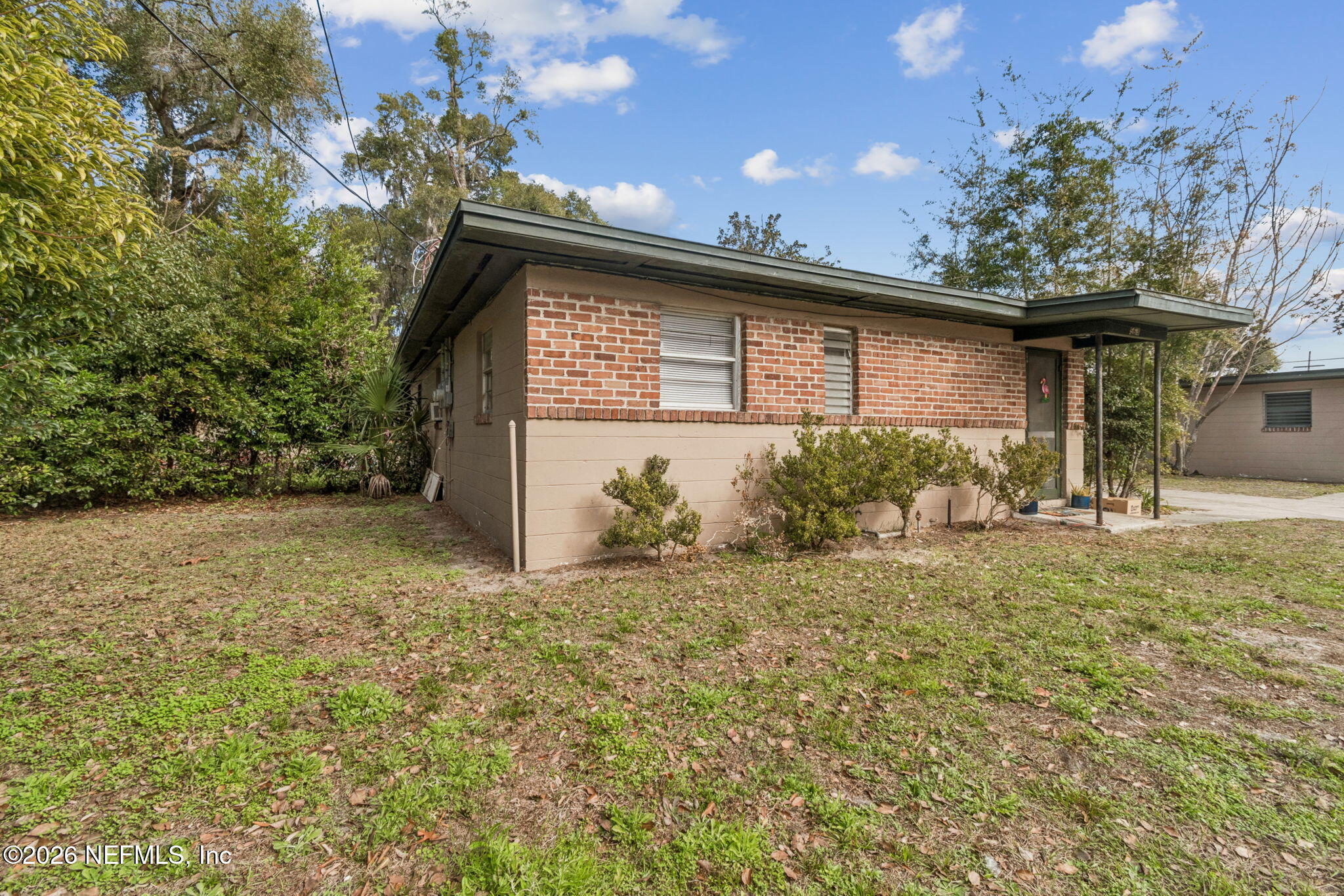 563 Eastport Road Jacksonville, FL 32218 - Photo 39 of 41 a view of a house with a yard