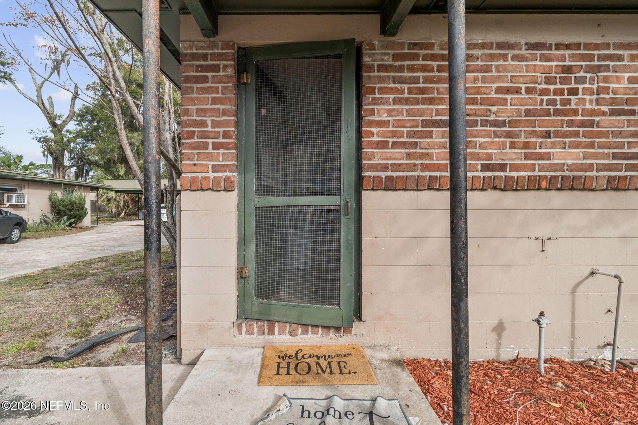 563 Eastport Road Jacksonville, FL 32218 - Photo 7 of 41 a view of a door and a window