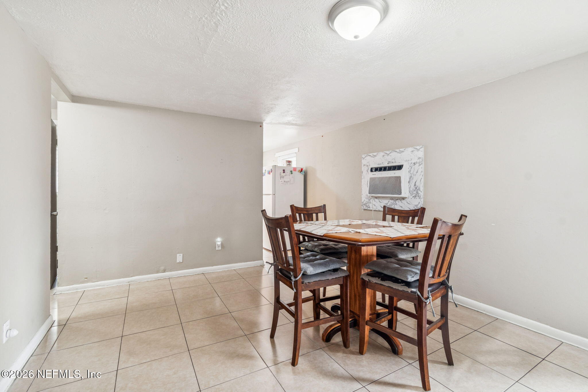 563 Eastport Road Jacksonville, FL 32218 - Photo 8 of 41 a view of a dining room with furniture