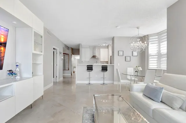 a bedroom with a bed and a lamp