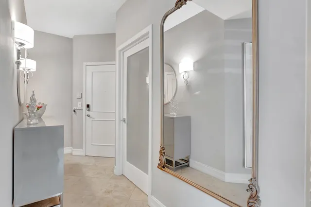 a kitchen with a sink and a stove top oven