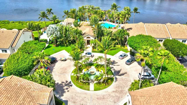 a view of a livingroom with workspace and a window