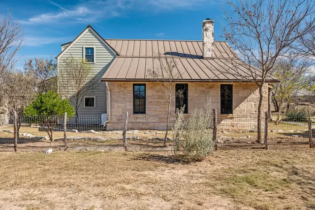 a front view of a house with a porch