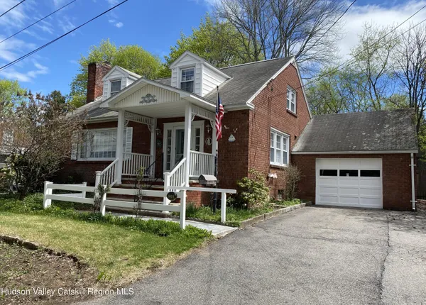 a room with a wooden floor and a sink
