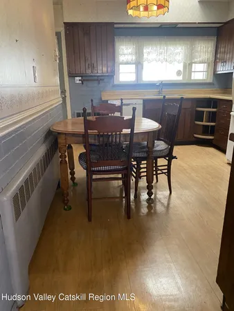 a white refrigerator freezer sitting inside of a kitchen