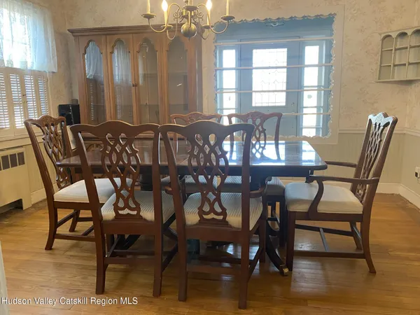 a kitchen with granite countertop a stove and a sink