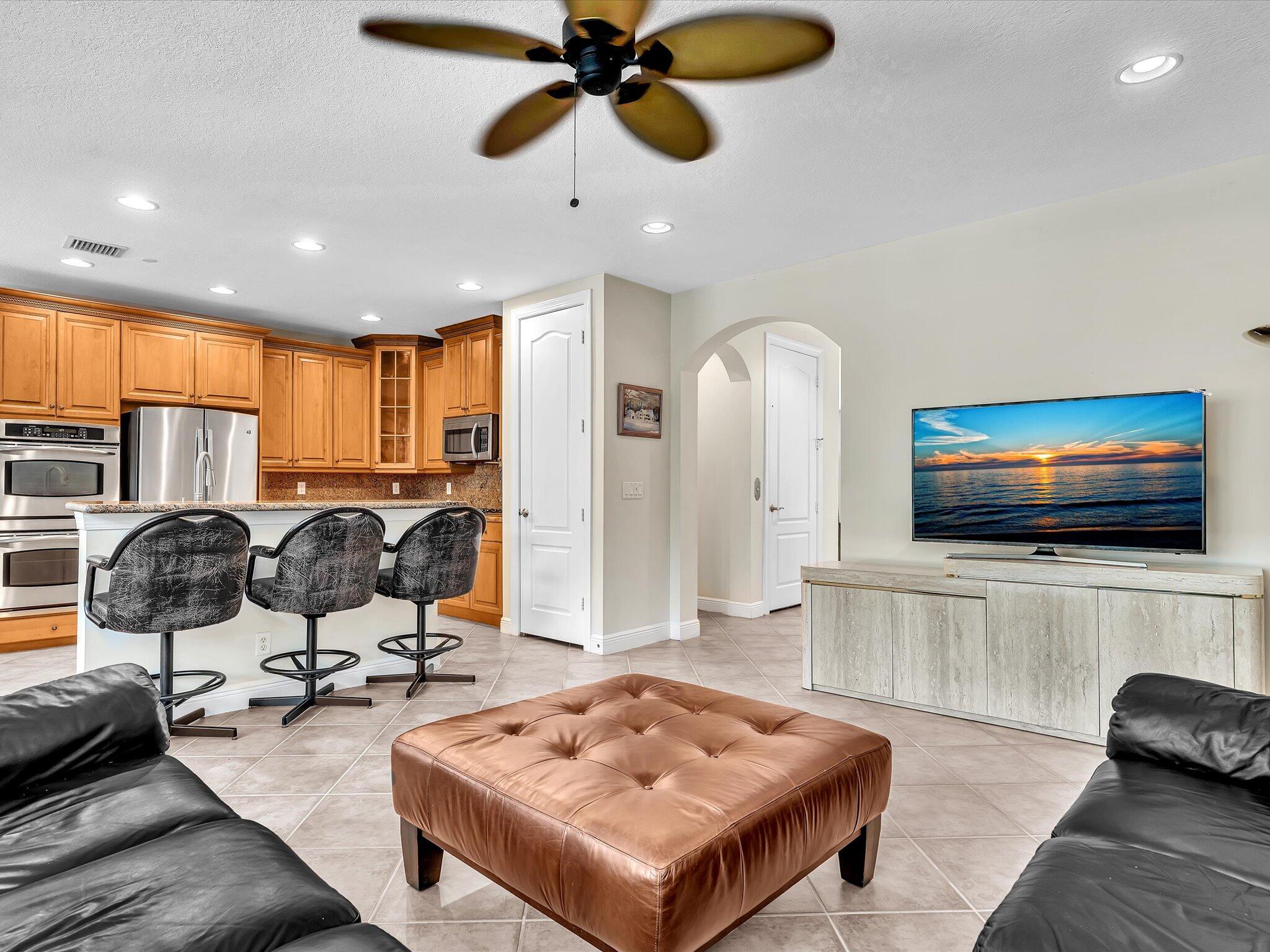 5575 Northeast Trieste Way Boca Raton, FL 33487 - Photo 17 of 38 Family/Kitchen