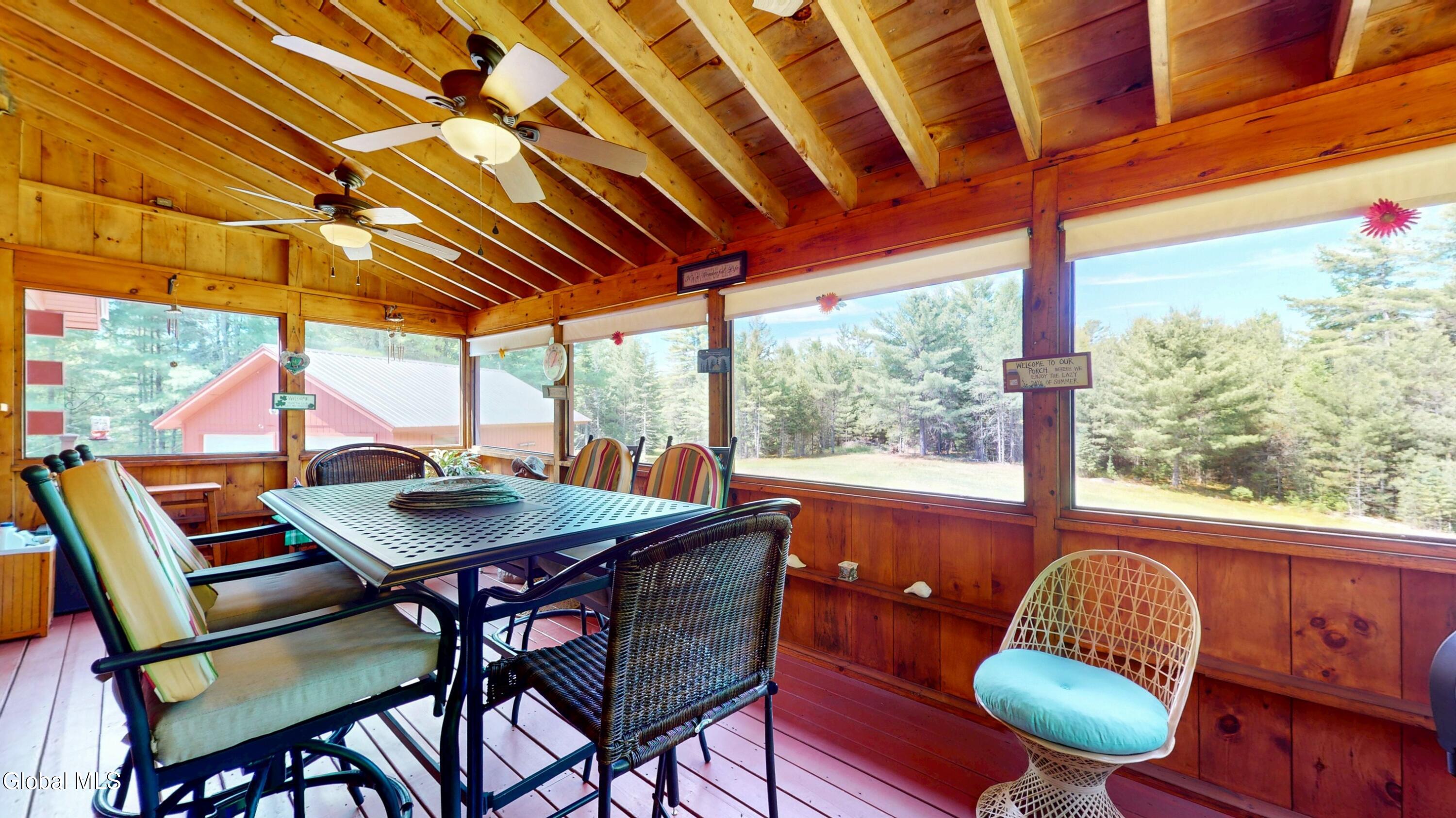 754 Church Road Minerva, NY 12857 - Photo 18 of 55 screened porch