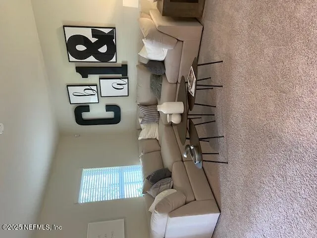 a view of entryway and workspace