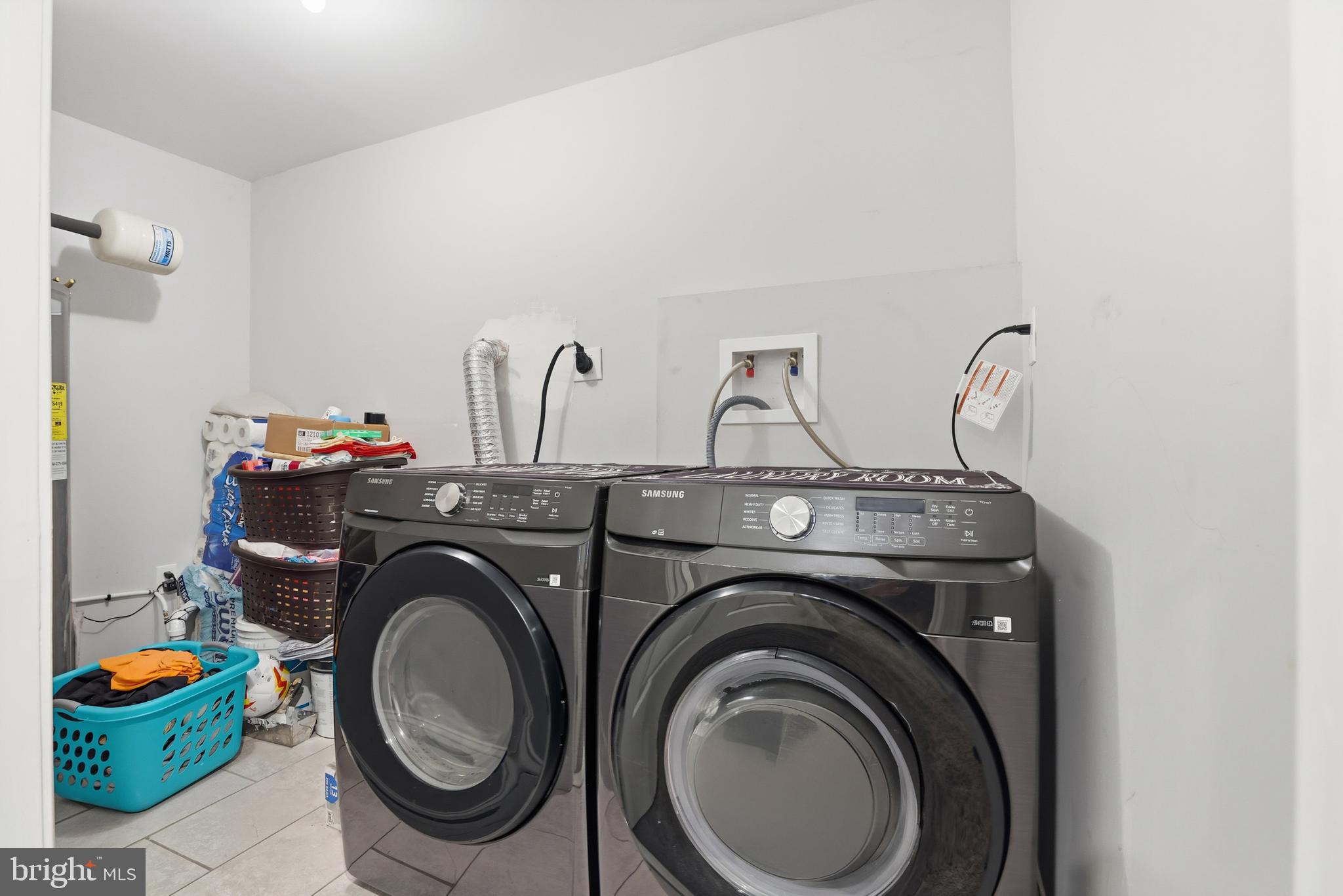 211 Jack Street Baltimore, MD 21225 - Photo 16 of 29 a utility room with dryer and washer