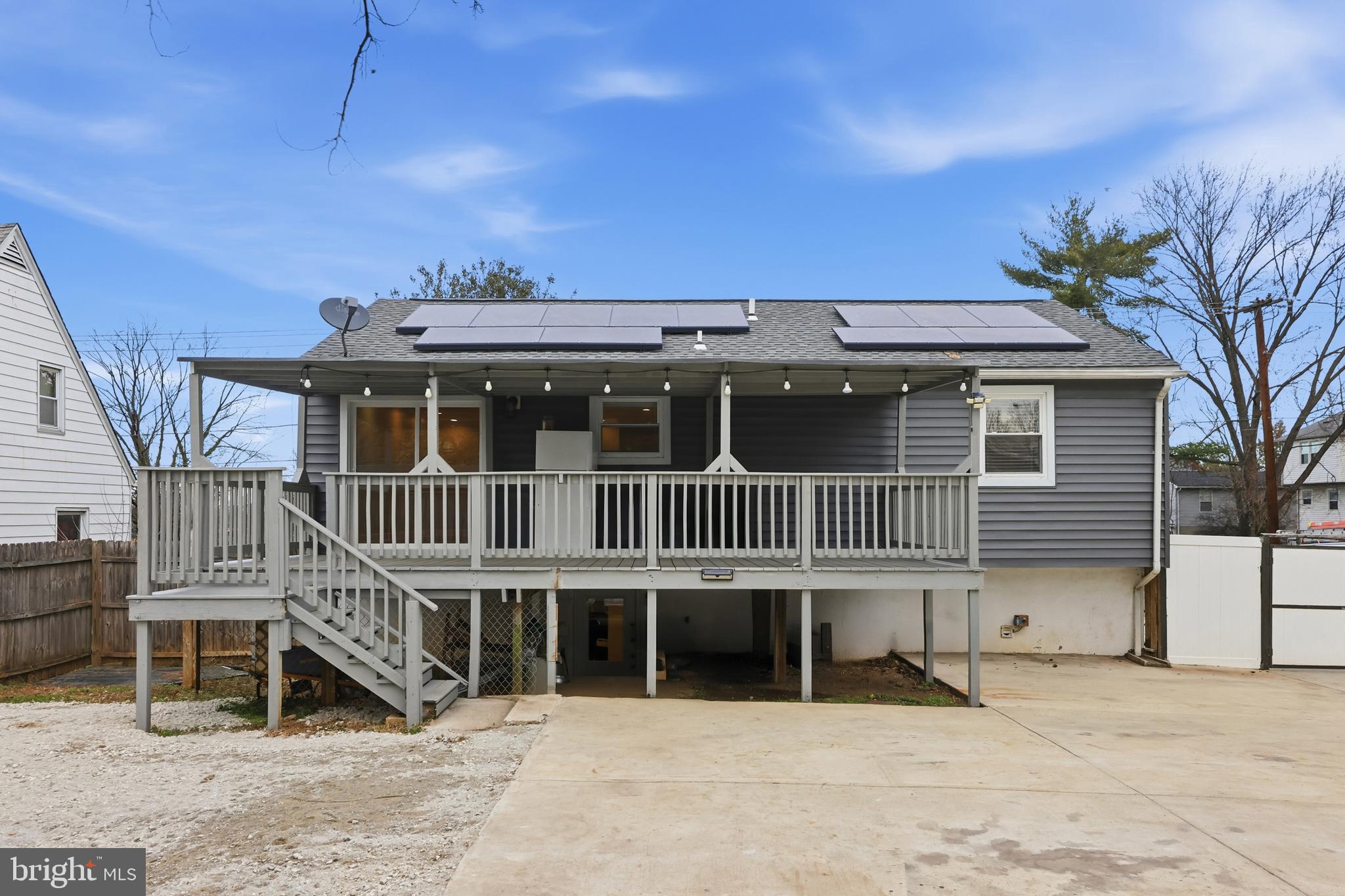 211 Jack Street Baltimore, MD 21225 - Photo 22 of 29 a front view of a house with a garden