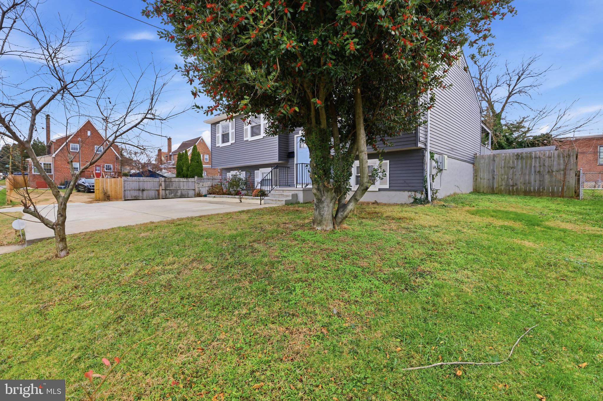 211 Jack Street Baltimore, MD 21225 - Photo 26 of 29 a house view with a sitting space and garden