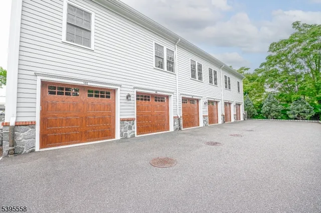 a view of a house with a garage