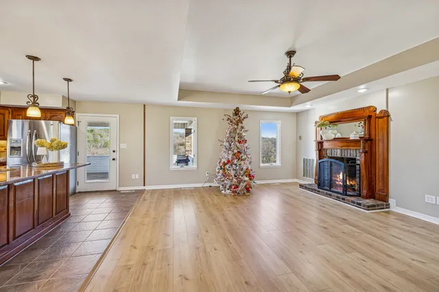 a view of a hallway with a wooden door