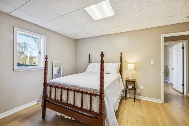 a bathroom with a sink a vanity and a mirror